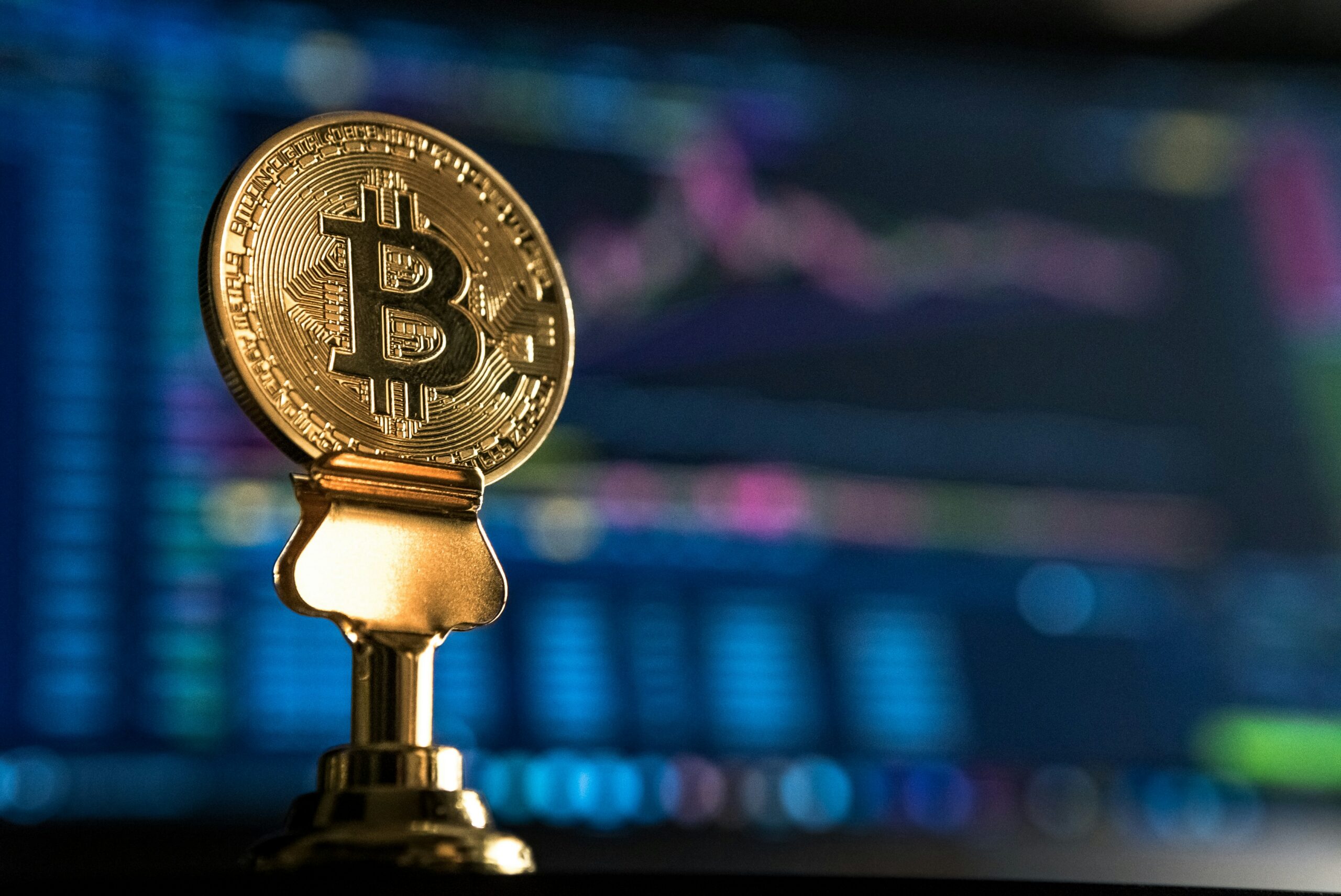 A trading desk showing why Bitcoin is going up on the charts